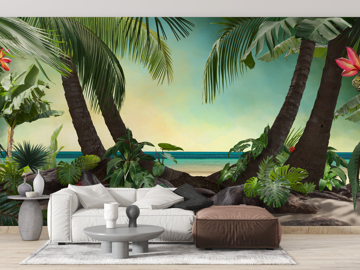 Beach Lagoon View wallpaper mural of tropical palms behind a white sofa and brown leather ottoman