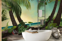 Beach Lagoon View wallpaper mural of palms over turquoise water in a bathroom with a white freestanding tub
