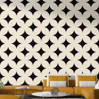 Stylish monochrome quatrefoil star wallpaper deco pattern.
