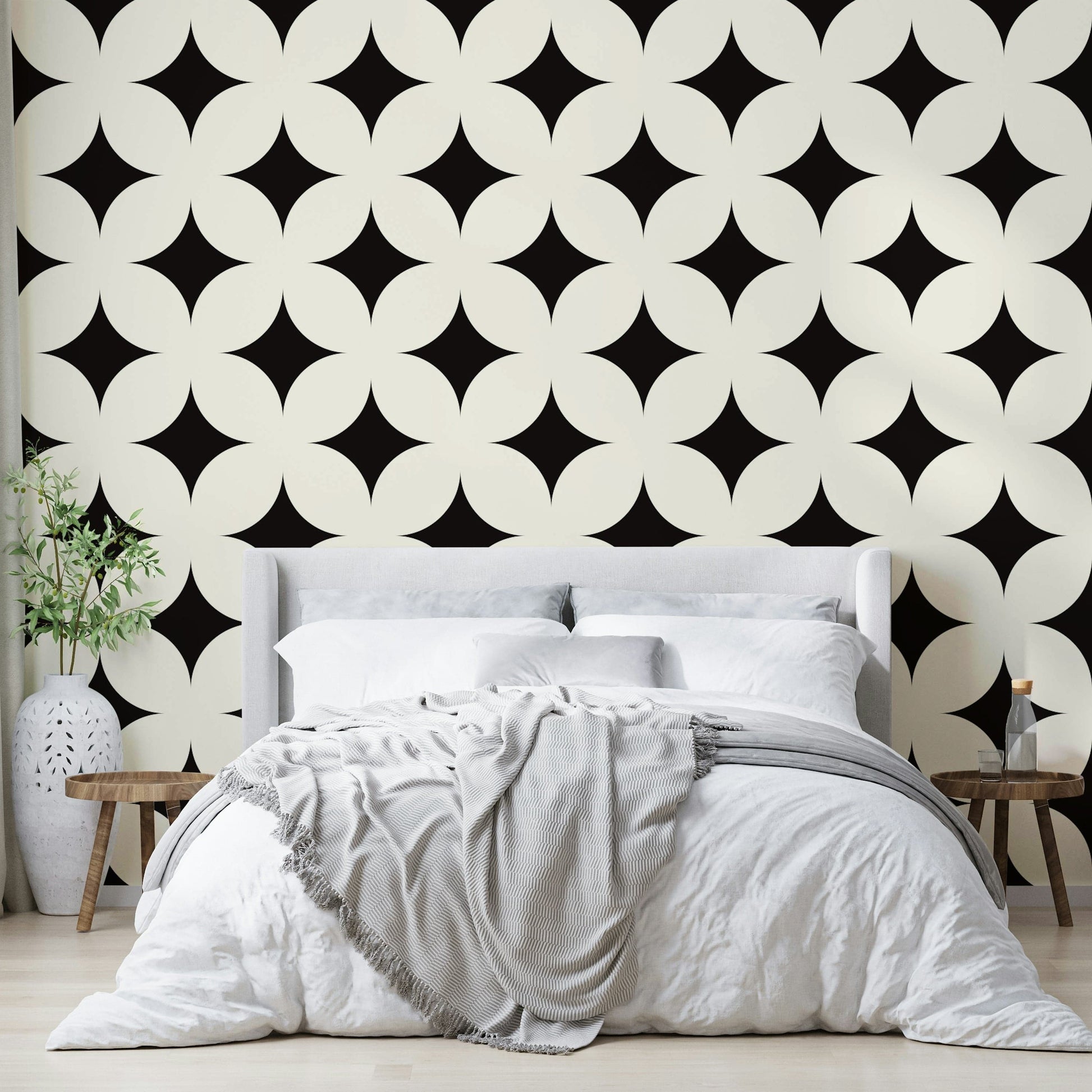 Chic black and ivory celestial deco wallpaper design.
