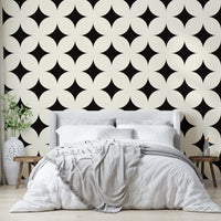 Chic black and ivory celestial deco wallpaper design.
