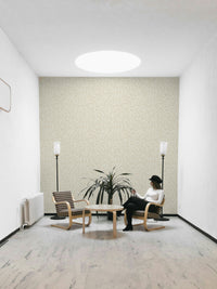 Soft and serene beige wallpaper with leaf accents

