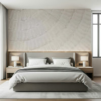 Coastal-inspired wall mural with layered oyster shell textures for a tranquil and airy ambiance.