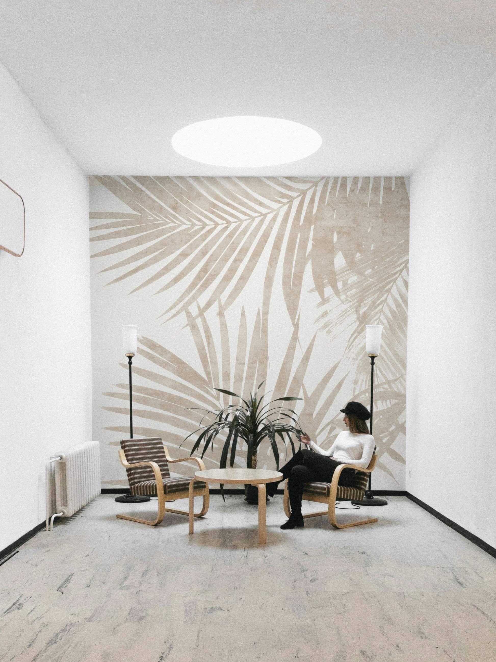 A fashionable botanical mural with a beige tone.