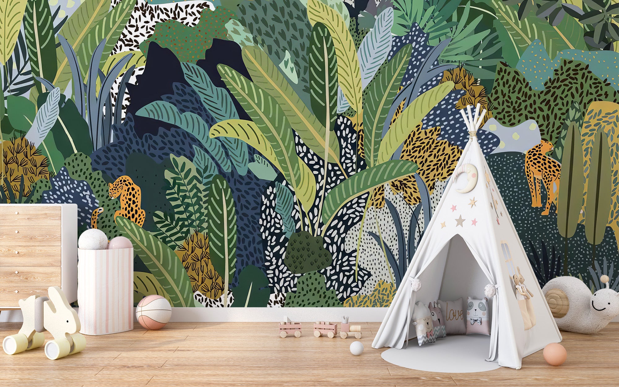 Hidden Jungle Cat wallpaper mural of green tropical leaves and leopards in a kids room with a white teepee, crib and toys