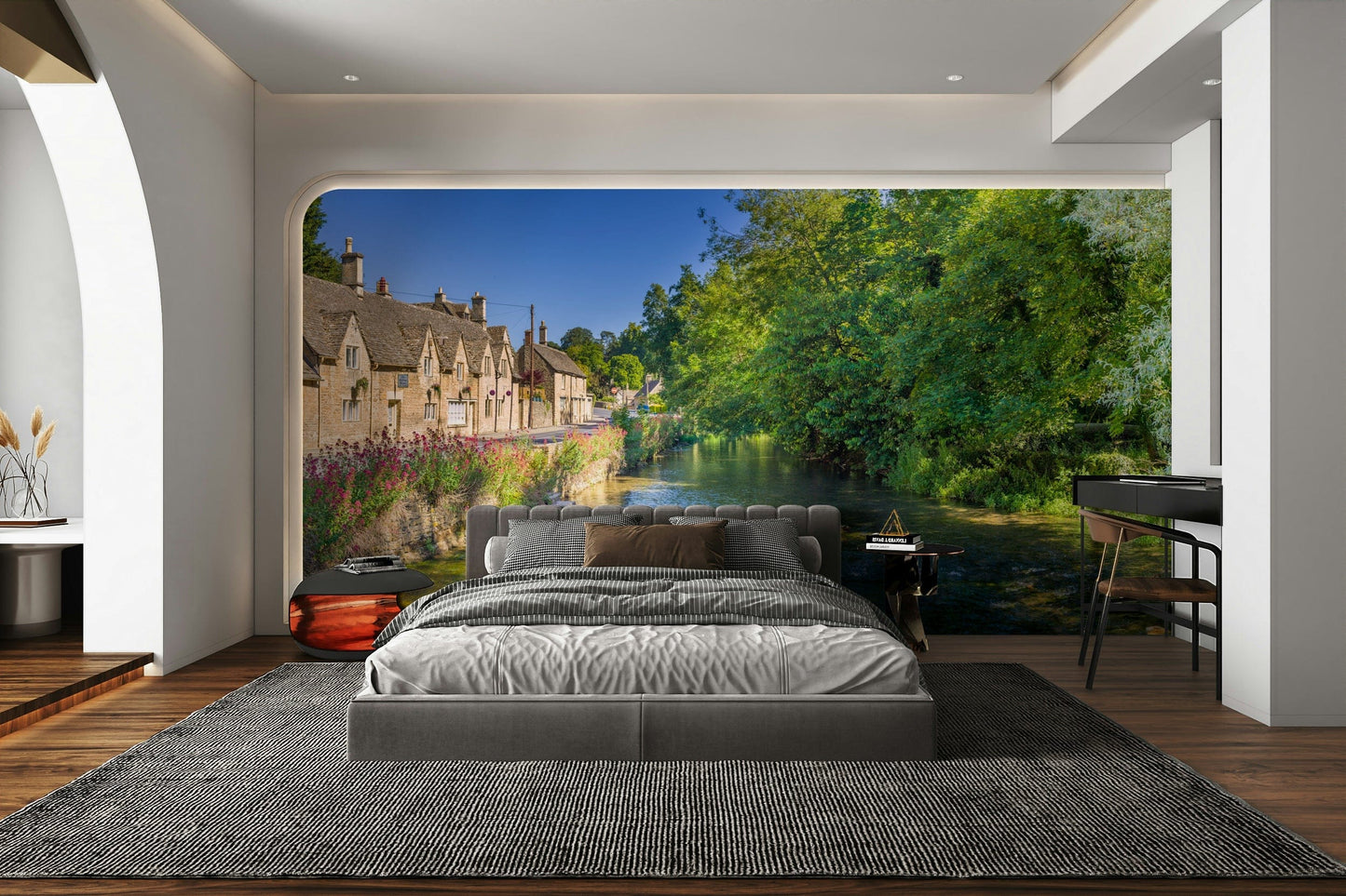 A peaceful Cotswold village mural on decorative wallpaper.


