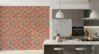 Antique apricot blossoms highlight this teal wallpaper