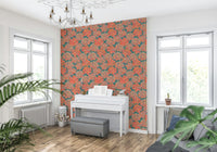 Teal background contrasts with apricot floral wallpaper.
