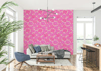Soft pink blooms cover this English floral wallpaper
