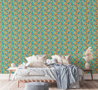 Big Bold Wildflowers Green wallpaper above a wooden platform bed with neutral bedding and a grey pouf