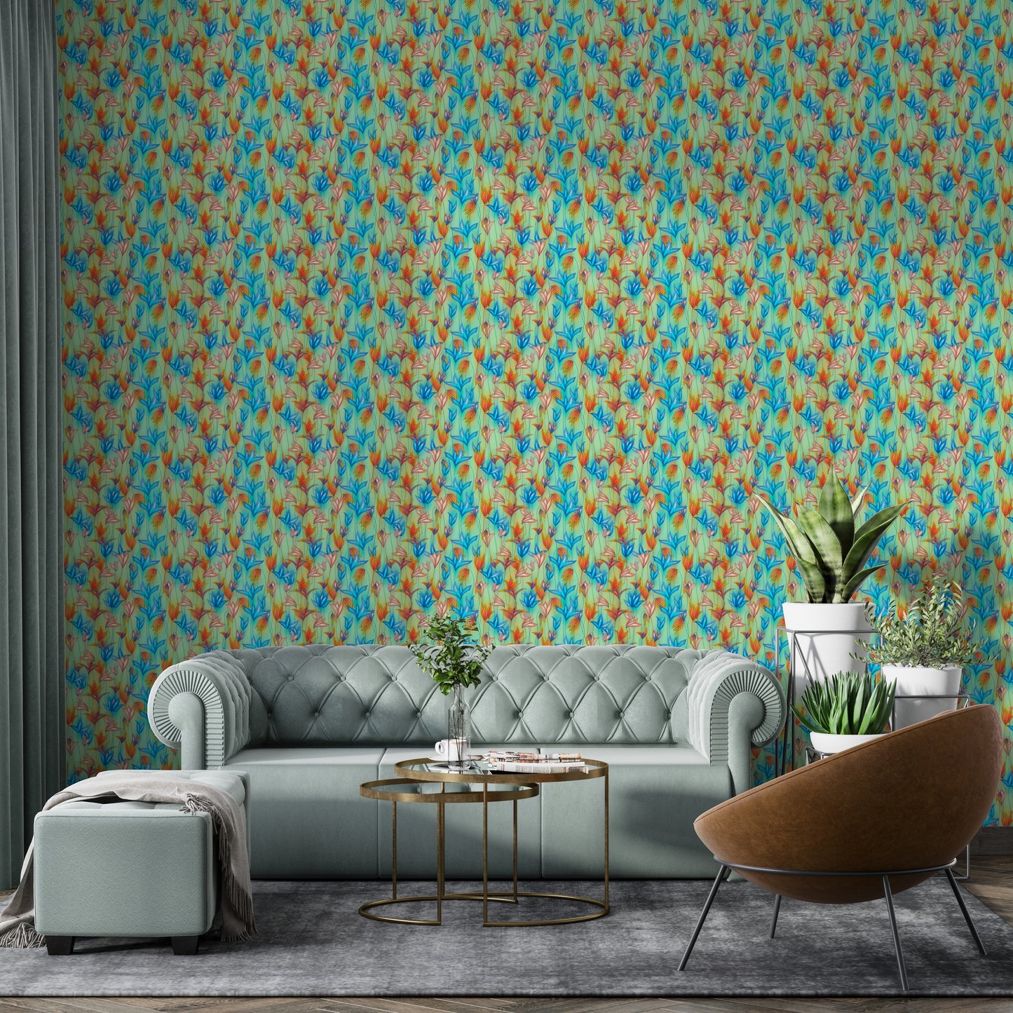 Big Bold Wildflowers Green wallpaper above a sage green chesterfield sofa and tan leather accent chair