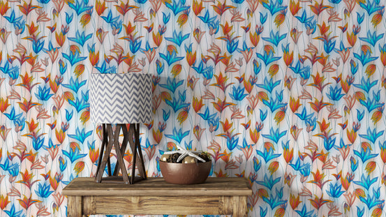 Big Bold Wildflowers White wallpaper with blue and orange blooms behind a console, chevron lamp and copper bowl