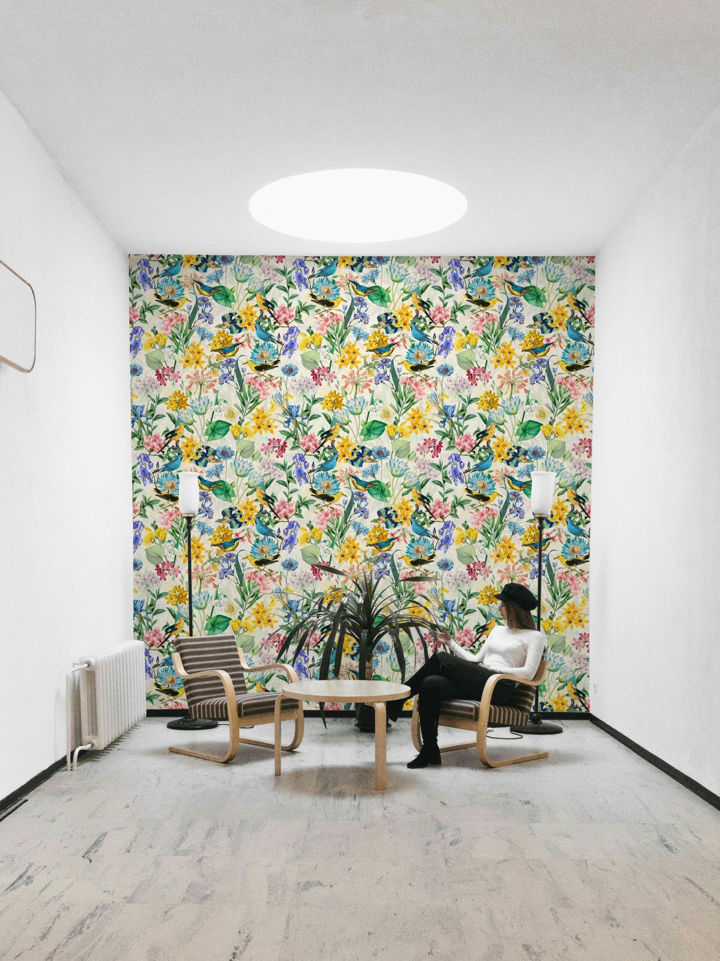 Birds perched on flowers in a beautiful, nature-inspired wallpaper design


