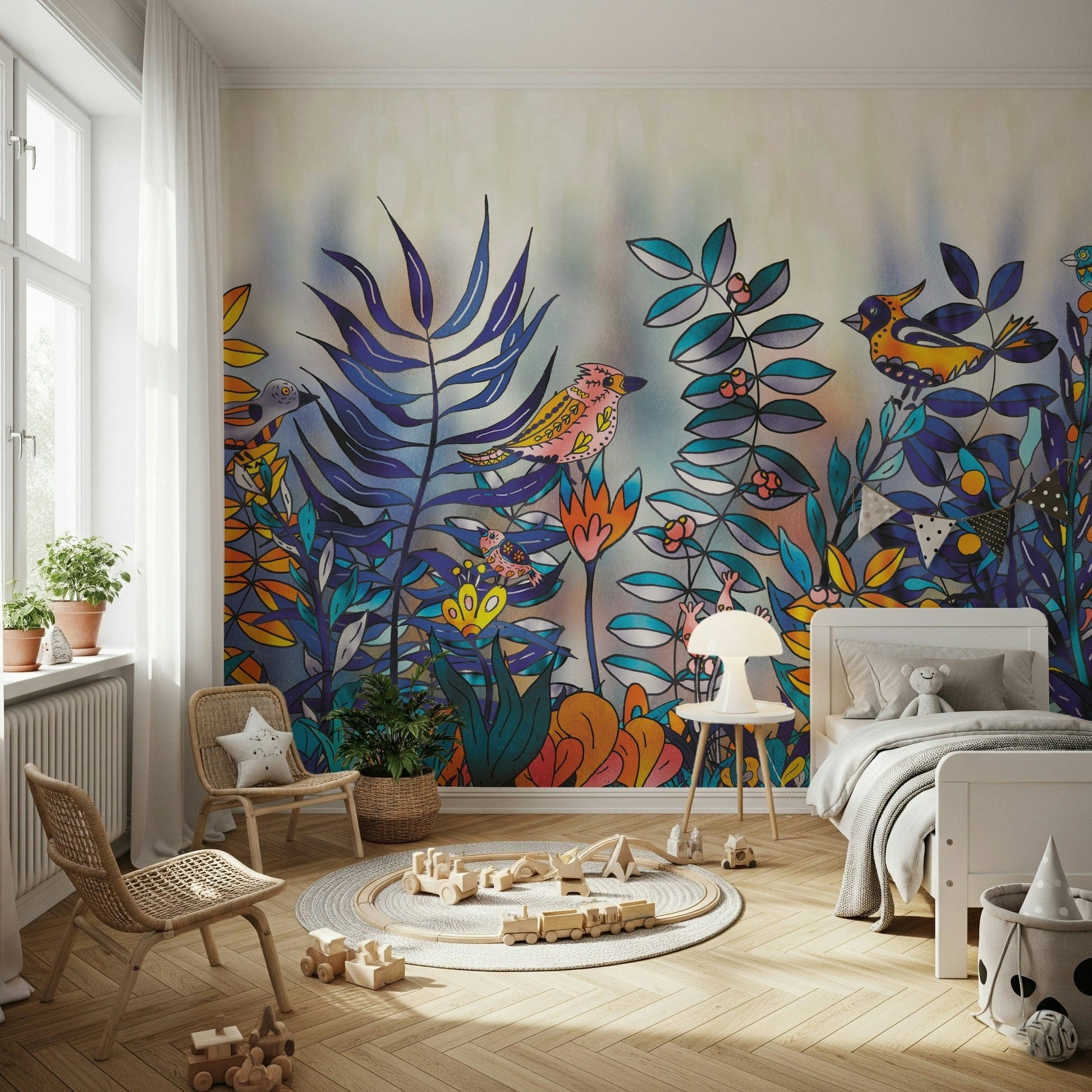 Enchanted Birds Forest wallpaper mural in a child's bedroom with rattan chairs, colorful birds and blue foliage