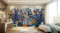 Enchanted Birds Forest wallpaper mural with colorful birds, blue ferns and flowers in a bedroom with a soft bed