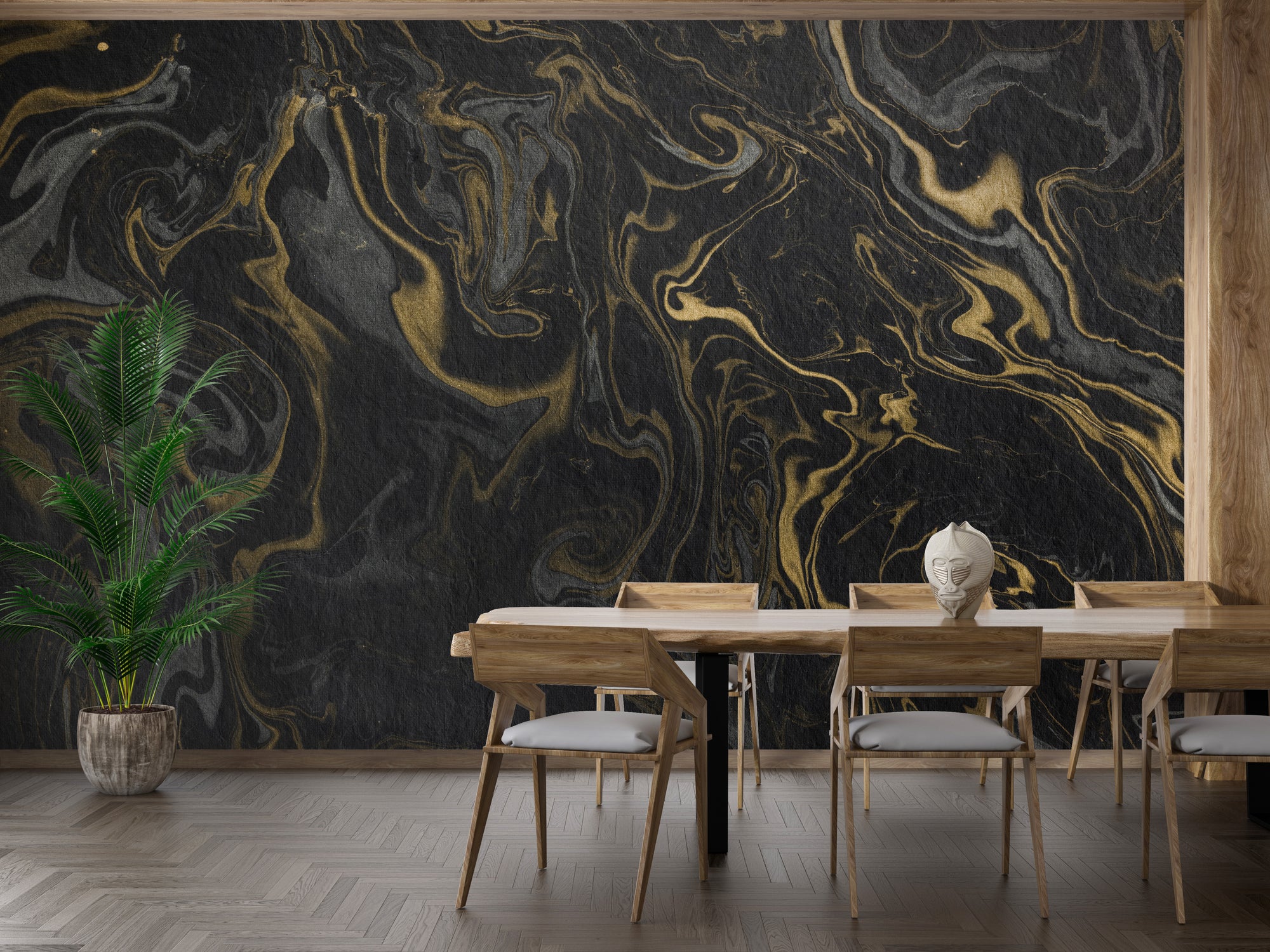Black and Gold Marble Effect wallpaper mural with swirling gold veins behind a wood dining table and potted palm