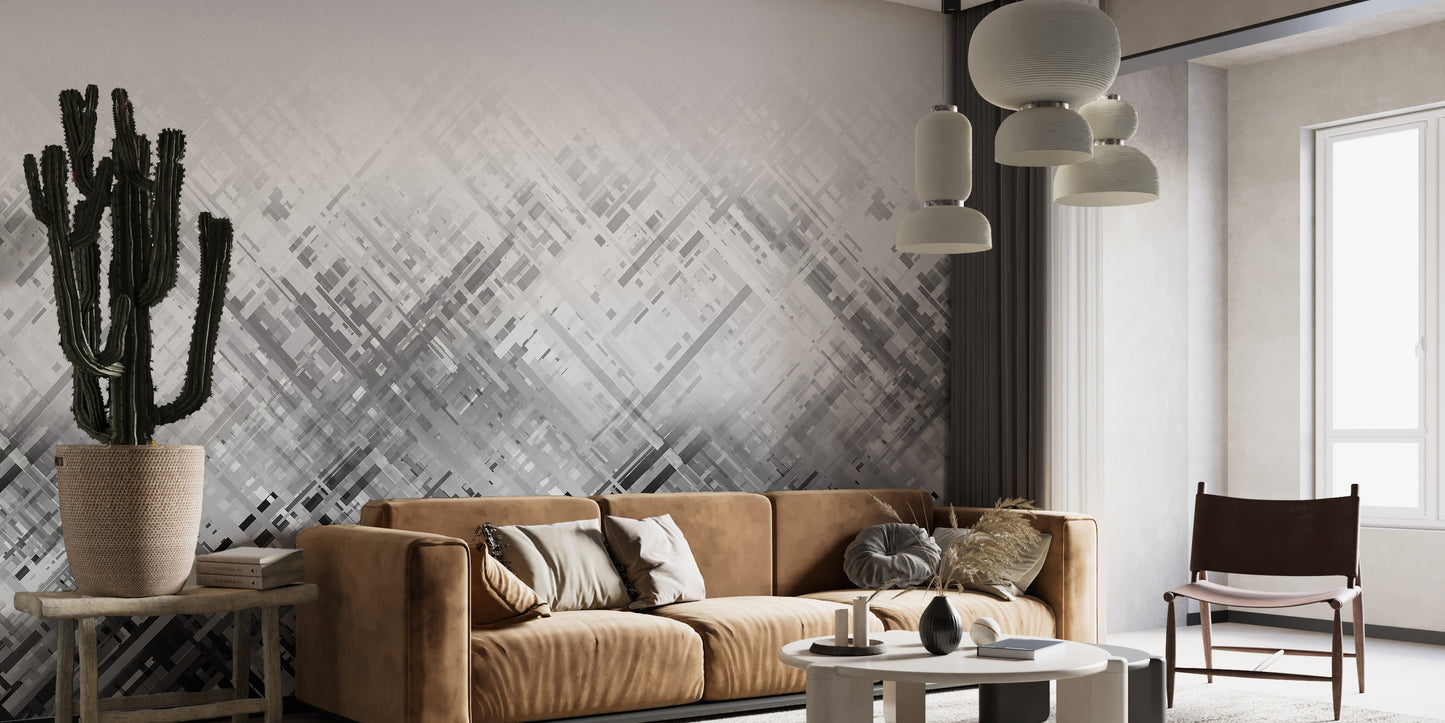 Abstract Diagonal Lines wallpaper mural in grey behind a tan leather sofa and tall cactus in a living room