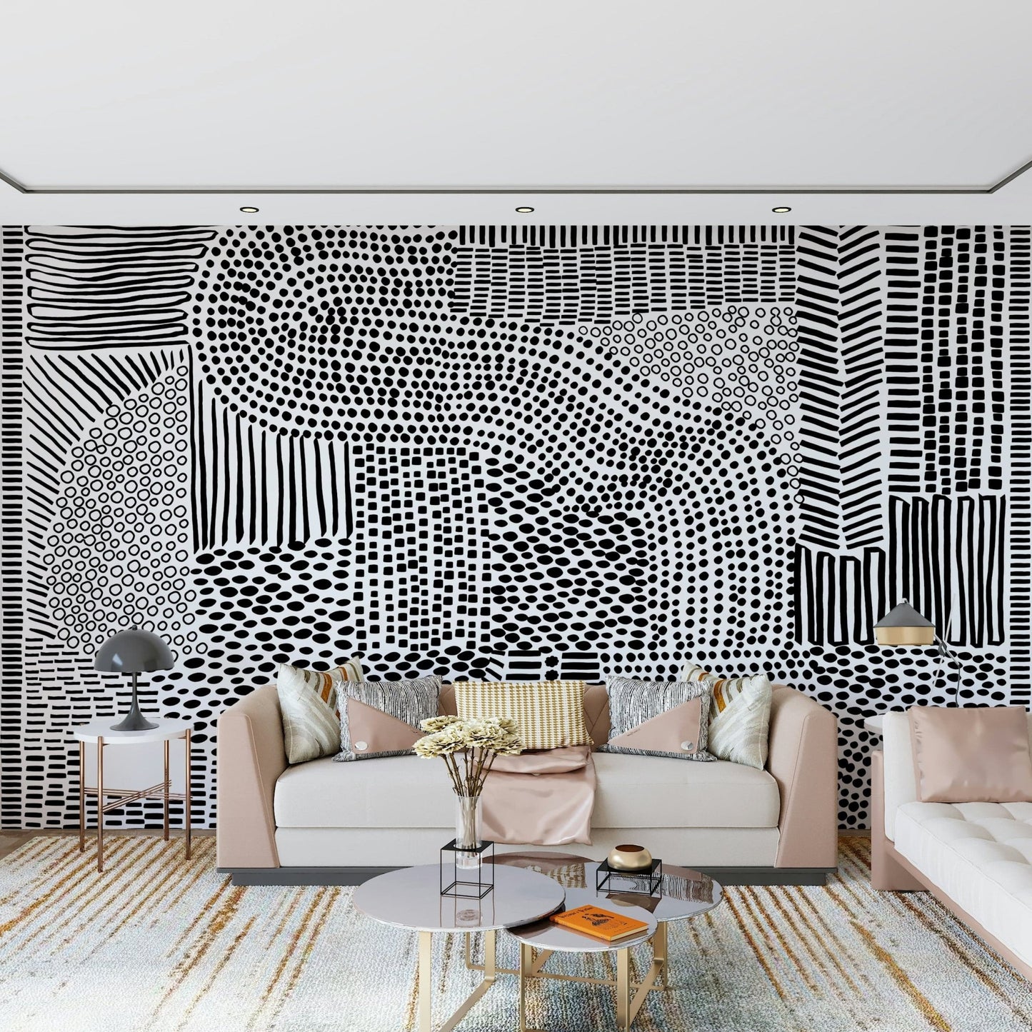 Black And White Maze wallpaper mural behind a blush pink sofa with gold accents in a living room