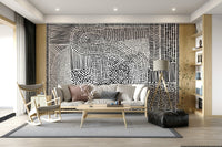 Black And White Maze wallpaper mural behind a white sofa and wood rocking chair in a living room
