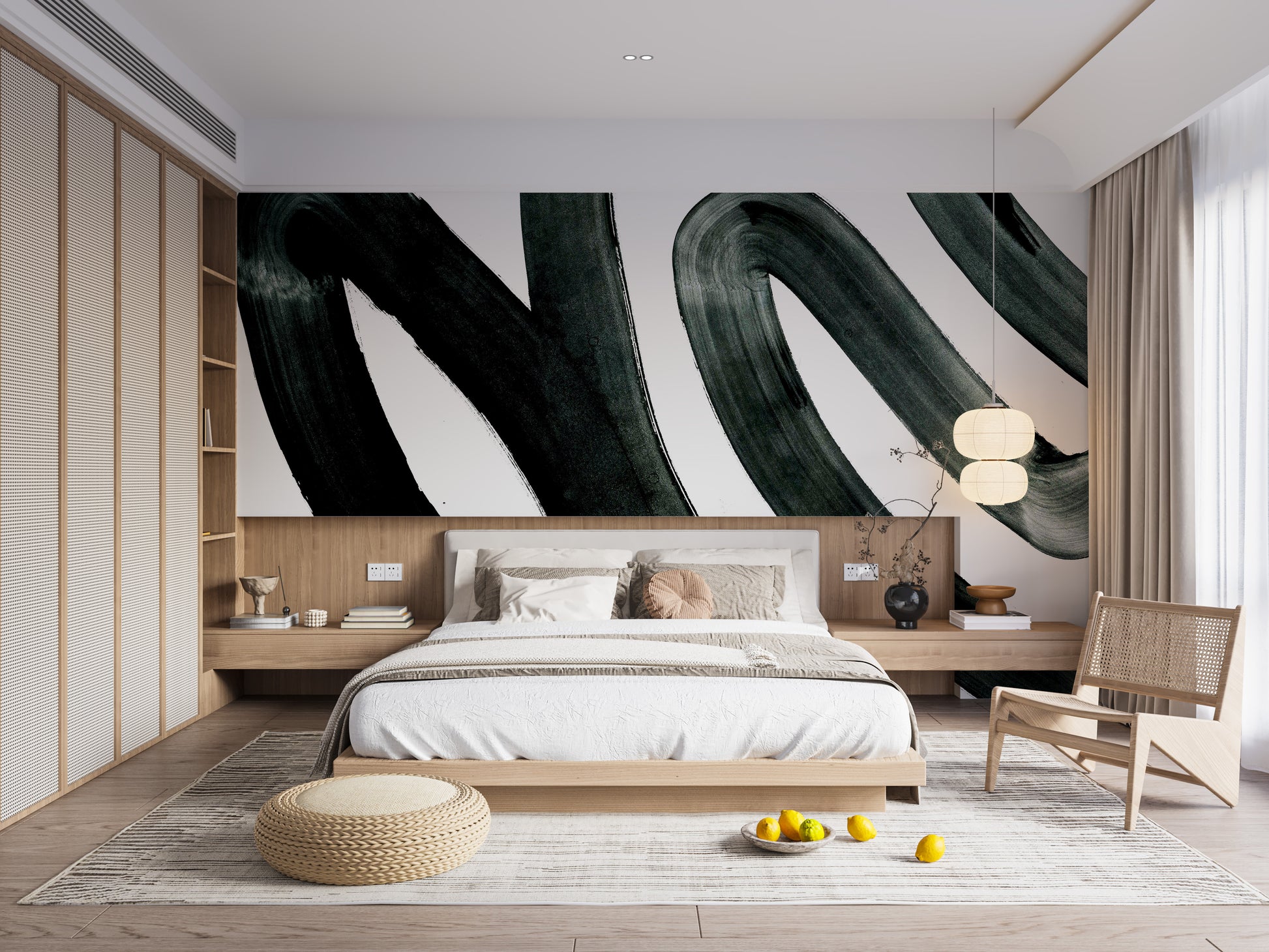 Black Brush Stroke wallpaper mural with black painterly swirls on white above a low wood platform bed and paper lantern