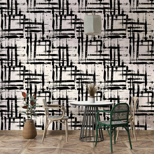An angled shot of a wall with a painted wallpaper

