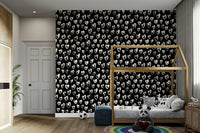 Cozy bedroom feature wall using dark heart wallpaper
