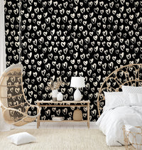 Hand drawn white hearts on black background wallpaper
