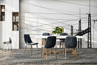 A graceful subtle smoke stack wall mural in cool, gray tones.

