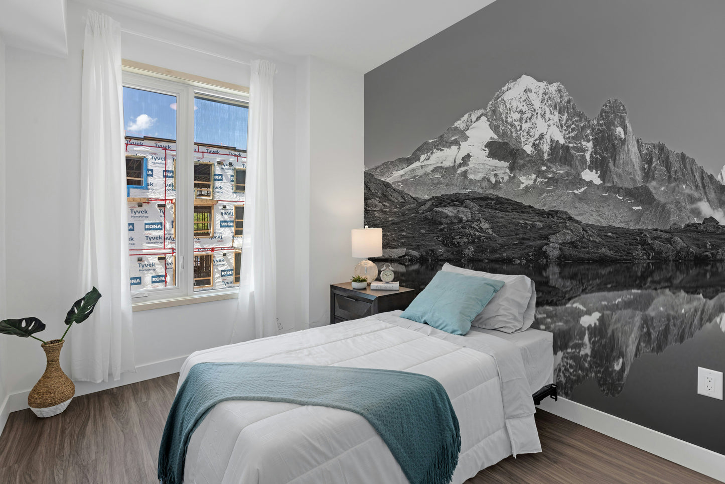 Black & White Landscape Mountain wallpaper mural styled along a hallway feature wall near a console in black and white