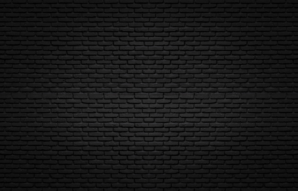 Black Texture Brick Wall Mural Wallpaper in your room — zoomed