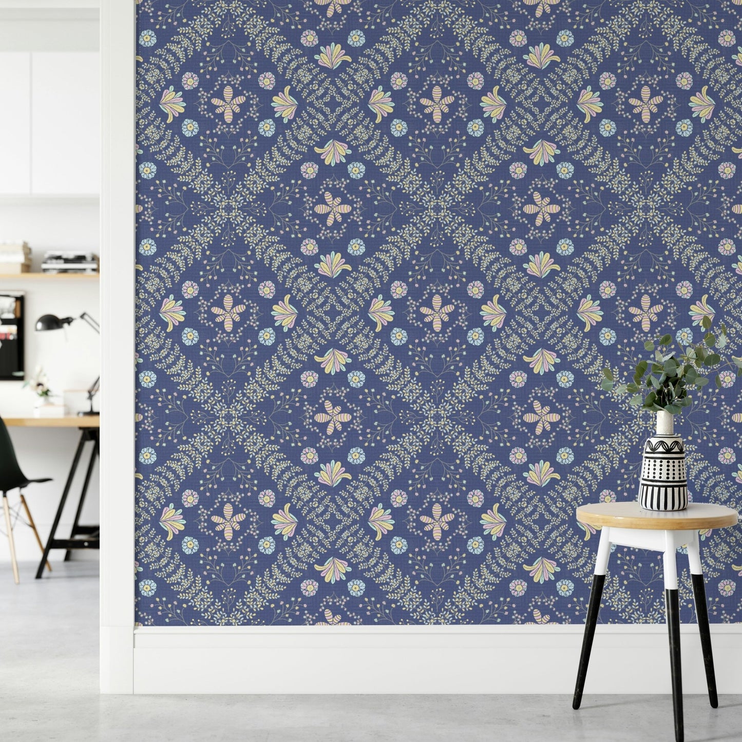 delicate botanical pattern on a dark blue background

