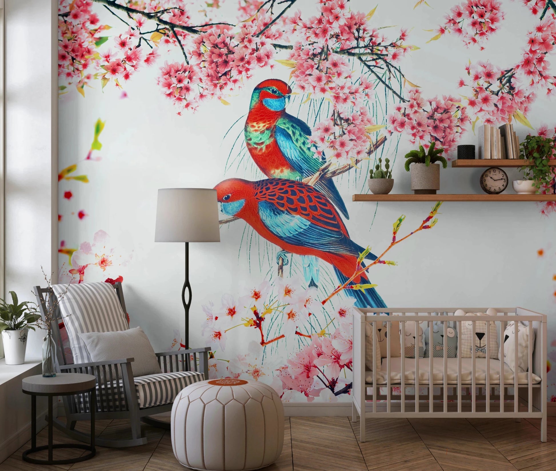 Blossom Birds wallpaper mural of parrots and cherry blossoms behind a white crib and rocking chair in a nursery