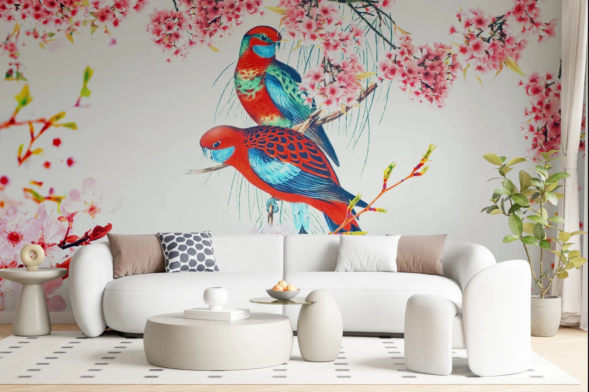 Blossom Birds wallpaper mural of red and teal parrots behind a curved white boucle sofa in a living room