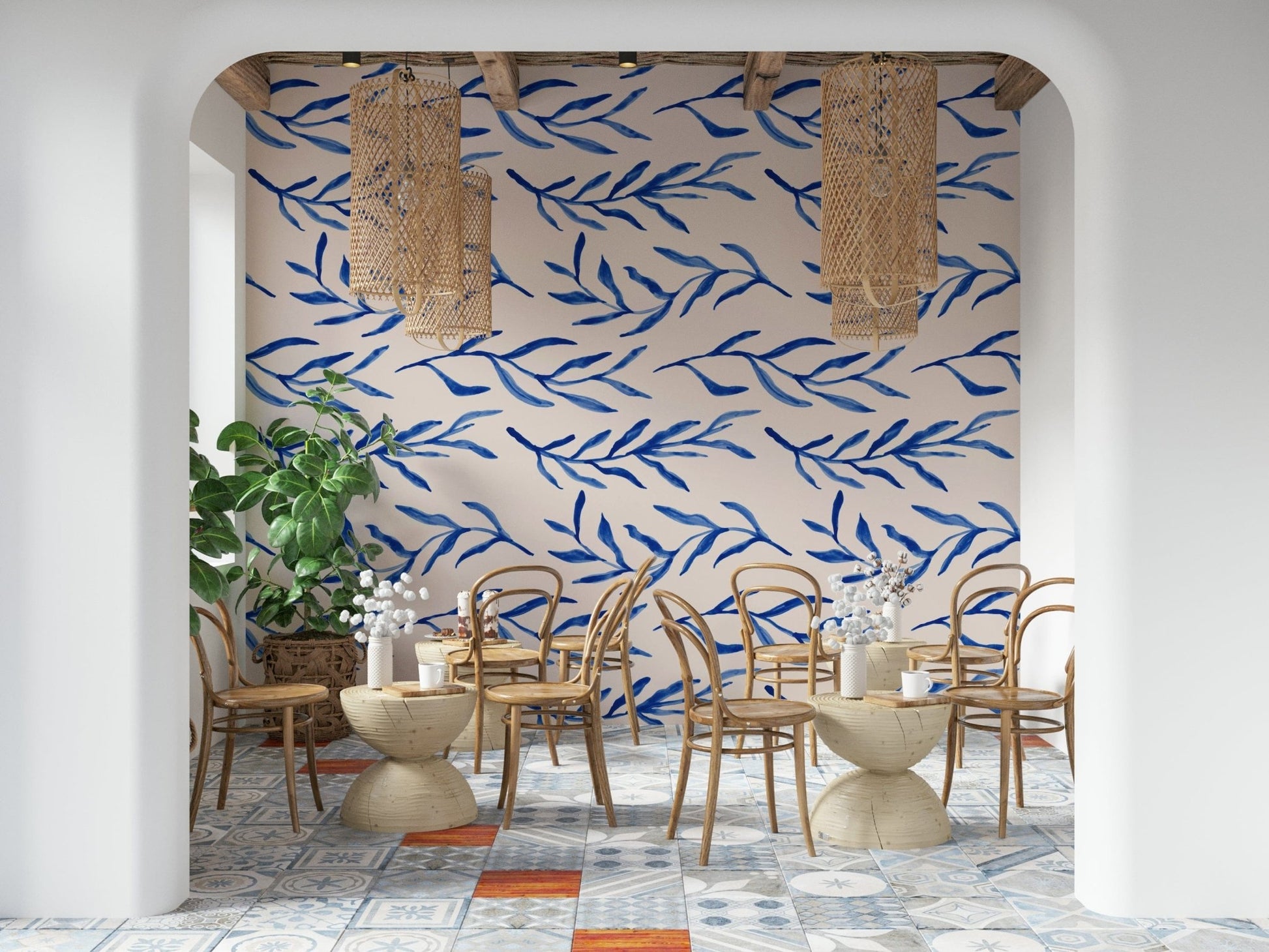 Soft blue botanical print featuring leafy branches and floral accents.