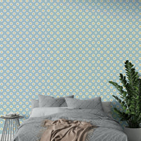 The background is a soft, elegant blue.


