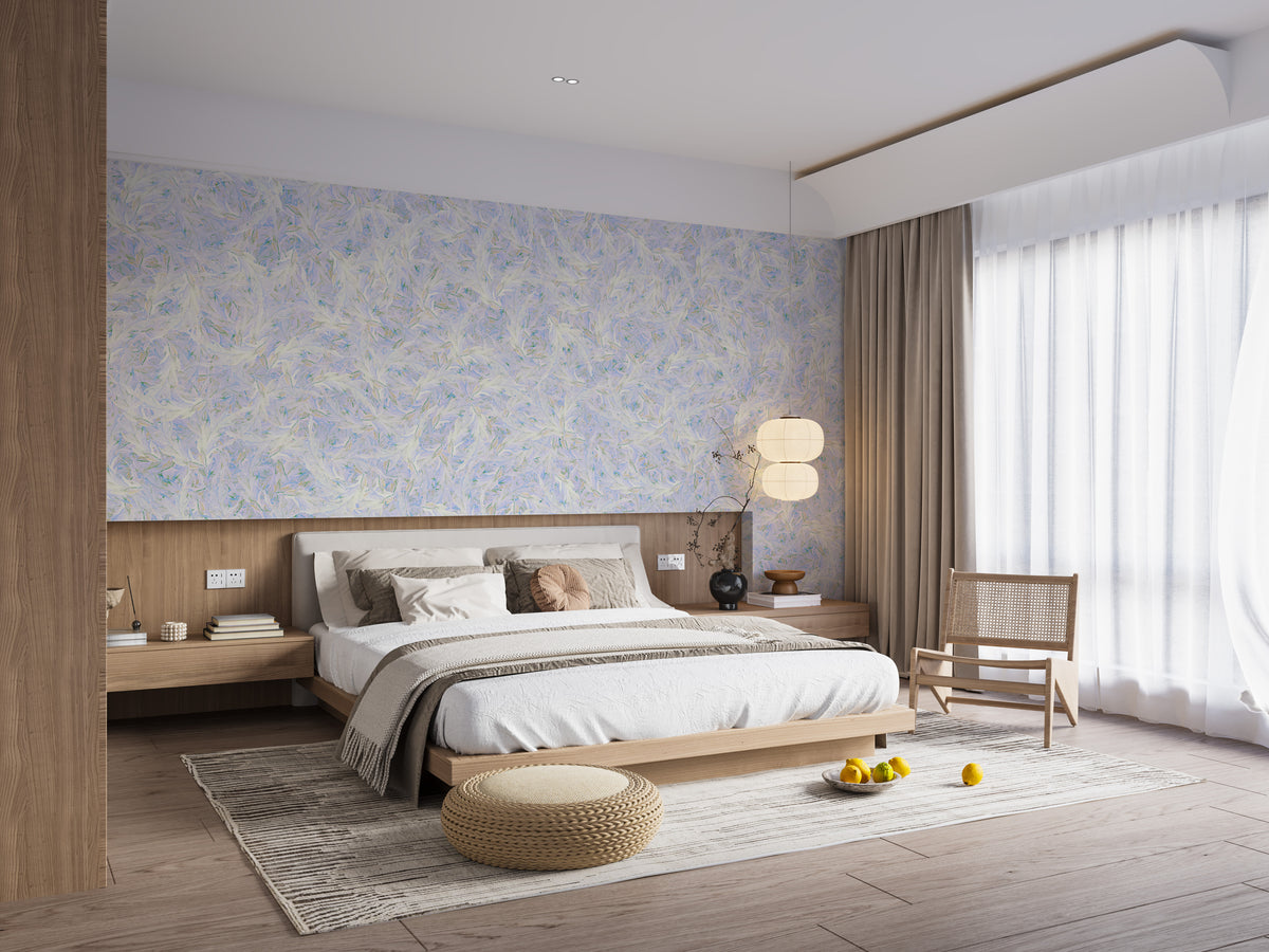 Blue Dancing Leaves Lila Azur wallpaper mural above a low wood platform bed in a calm modern bedroom