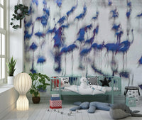 Flamingo Mirage wallpaper mural of blue flamingos behind a mint green daybed and toys in a child's nursery