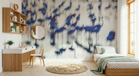 Flamingo Mirage wallpaper mural of abstract blue flamingos behind a wood bed and desk in a teen bedroom