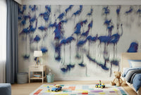 Flamingo Mirage wallpaper mural of abstract blue flamingos behind a wood bed and toy cars in a child's bedroom