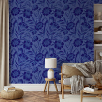 The color palette is monochromatic, with different shades of deep sapphire blue.
