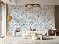 Azure Bloom Garden Wallpaper providing a soft background for a home workspace.