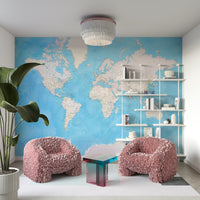 Watercolor-style global map in cool blue hues

