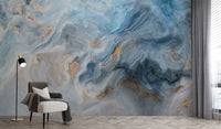 Blue Marble wallpaper mural styled along a hallway feature wall near a console in blue tones