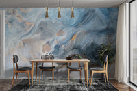 Blue Marble wallpaper mural as a feature wall in a home office workspace in blue tones