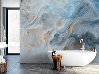Blue Marble wallpaper mural as a bedroom feature wall behind the headboard in blue tones