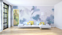 Blue Orchids Foggy wallpaper mural styled along a hallway feature wall near a console in blue tones