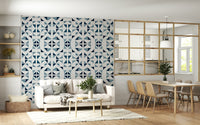 Geometric wallpaper with layered triangles in blue tones for a calming, elegant space.