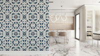 Abstract triangle pattern wallpaper in cool blue hues for a contemporary interior look.