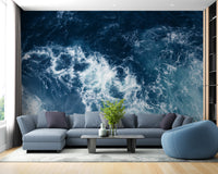 Blue Water wallpaper mural as a bedroom feature wall behind the headboard in blue tones