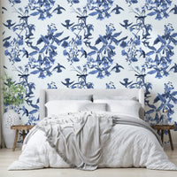 A peaceful nature scene mural on decorative wallpaper.

